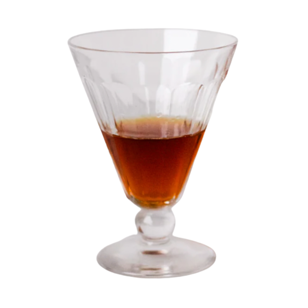 Vintage-inspired crystal wine glass with a fluted bowl and short pedestal base.