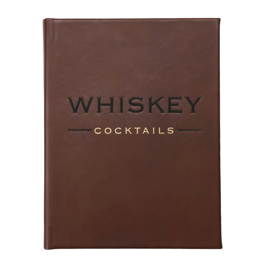 Brown hardcover book with “Whiskey Cocktails” embossed in black and gold on the front.