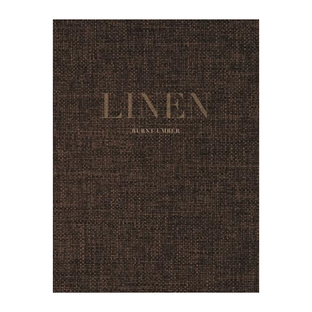 Brown textured ‘LINEN’ coffee table book with woven-look cover—elevated neutral styling piece.