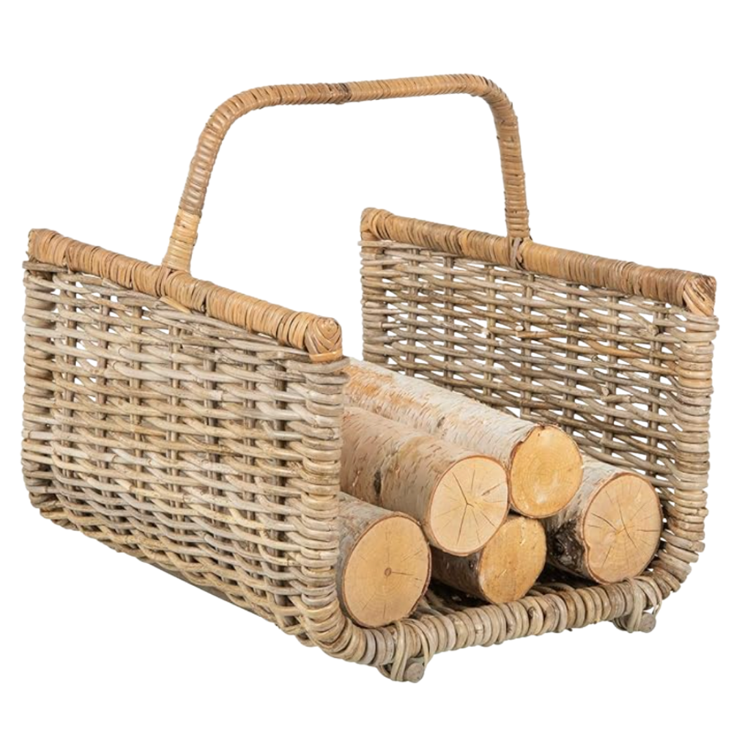Rectangular wicker firewood basket with handle, styled with birch logs—textural hearth storage.