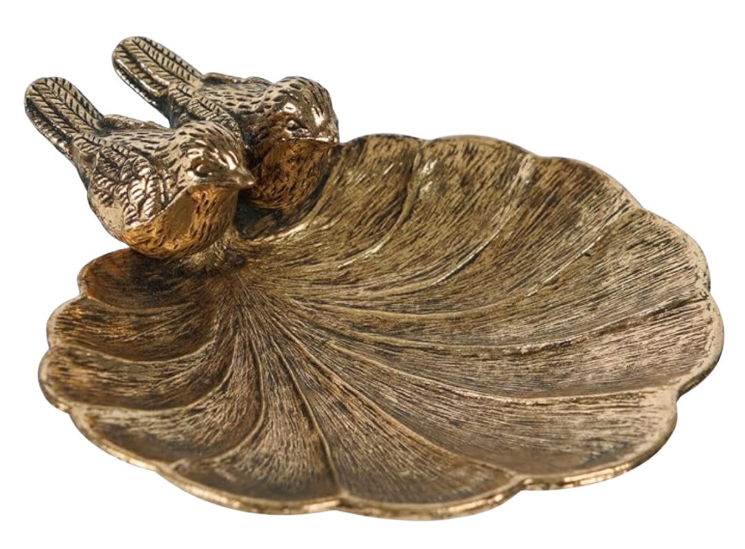 Antique-style brass dish shaped like a leaf with two perched birds—tray for rings, matches, or salts.