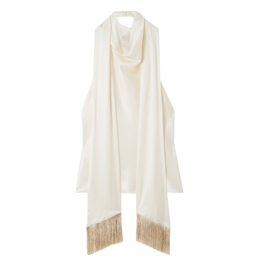 Ivory halter-style top with long scarf panels finished in gold fringe.