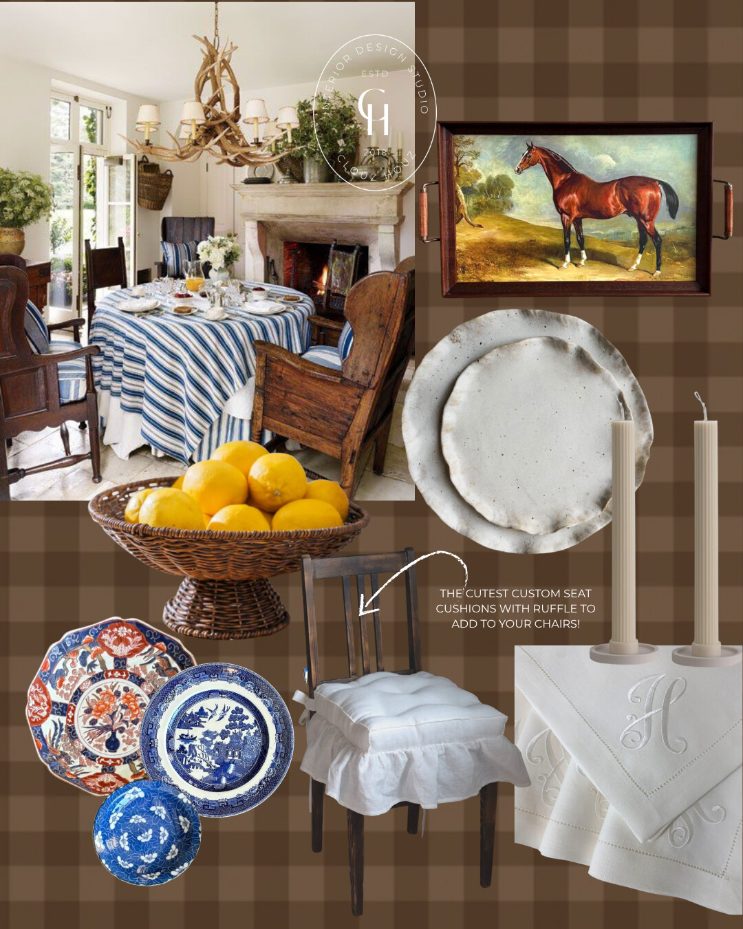 Collected dining vignette: round table in blue stripe cloth, antique wood chairs with ruffled linen seat cushion, ripple-edge ceramic plates, pair of candlesticks, wicker pedestal bowl of lemons, blue-and-white plates, and vintage horse art tray