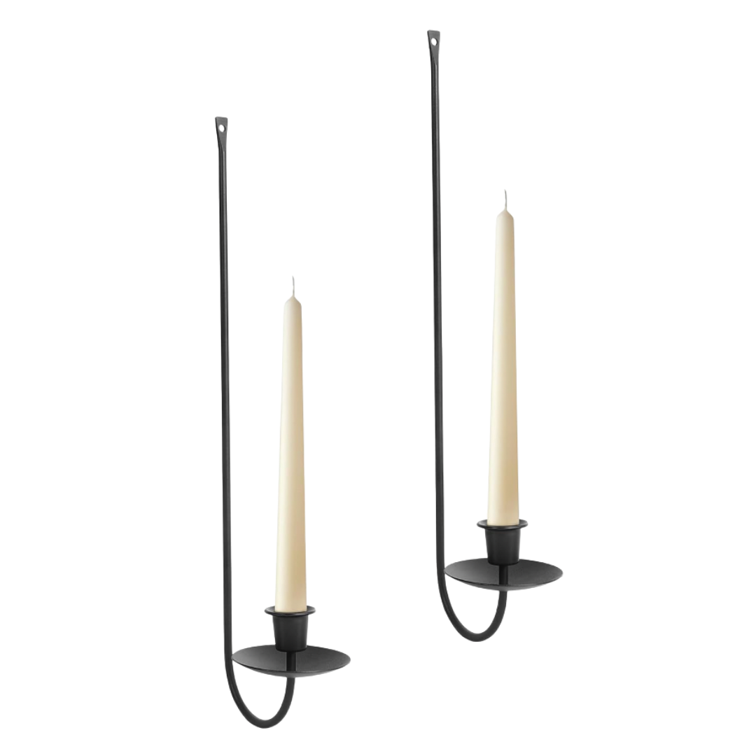 Set of minimalist black iron wall-mounted taper candle holders—romantic glow for halls or nooks.