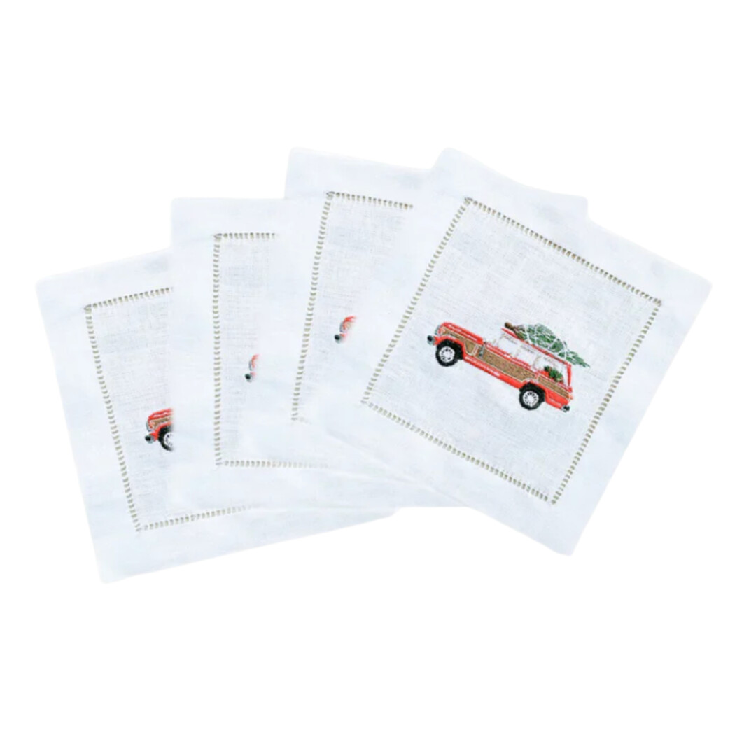 Embroidered holiday cocktail napkins featuring the iconic red station wagon from Christmas Vacation—a nostalgic touch for festive entertaining.