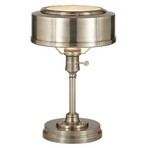 Vintage-inspired brass library lamp with a round shade and adjustable switch.