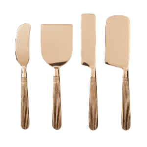 Set of four copper-toned cheese knives with textured handles.