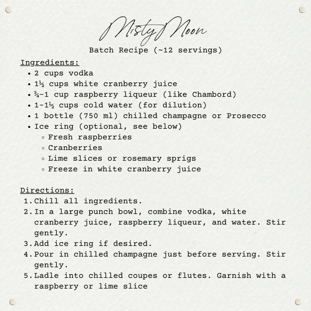 A cream-colored recipe card titled “Misty Moon” with elegant script font. The card lists a batch cocktail recipe for about 12 servings, including ingredients such as vodka, white cranberry juice, raspberry liqueur, cold water, champagne, and an optional ice ring with raspberries, cranberries, and citrus. Directions below explain how to chill, mix, and serve the punch in a bowl with champagne added at the end. The design features tiny corner details that give it a vintage, textured paper look.