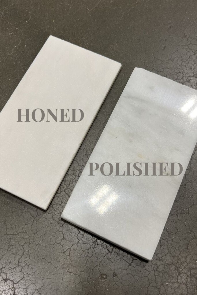 Side-by-side comparison of honed and polished marble tiles showing the difference in finish and sheen.