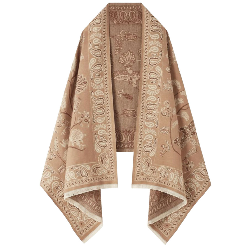 I just bought this and I’m already obsessed. It’s one of those pieces that instantly elevates an outfit—draped over a sweater, tied around your shoulders, or even carried into spring with a white tee. Easy, chic, and surprisingly versatile.