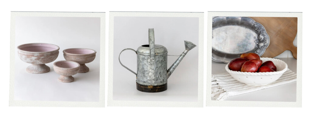 A trio of styled objects including blush-toned pedestal bowls, a vintage galvanized metal watering can, and a white ceramic bowl filled with peaches beside a silver tray.