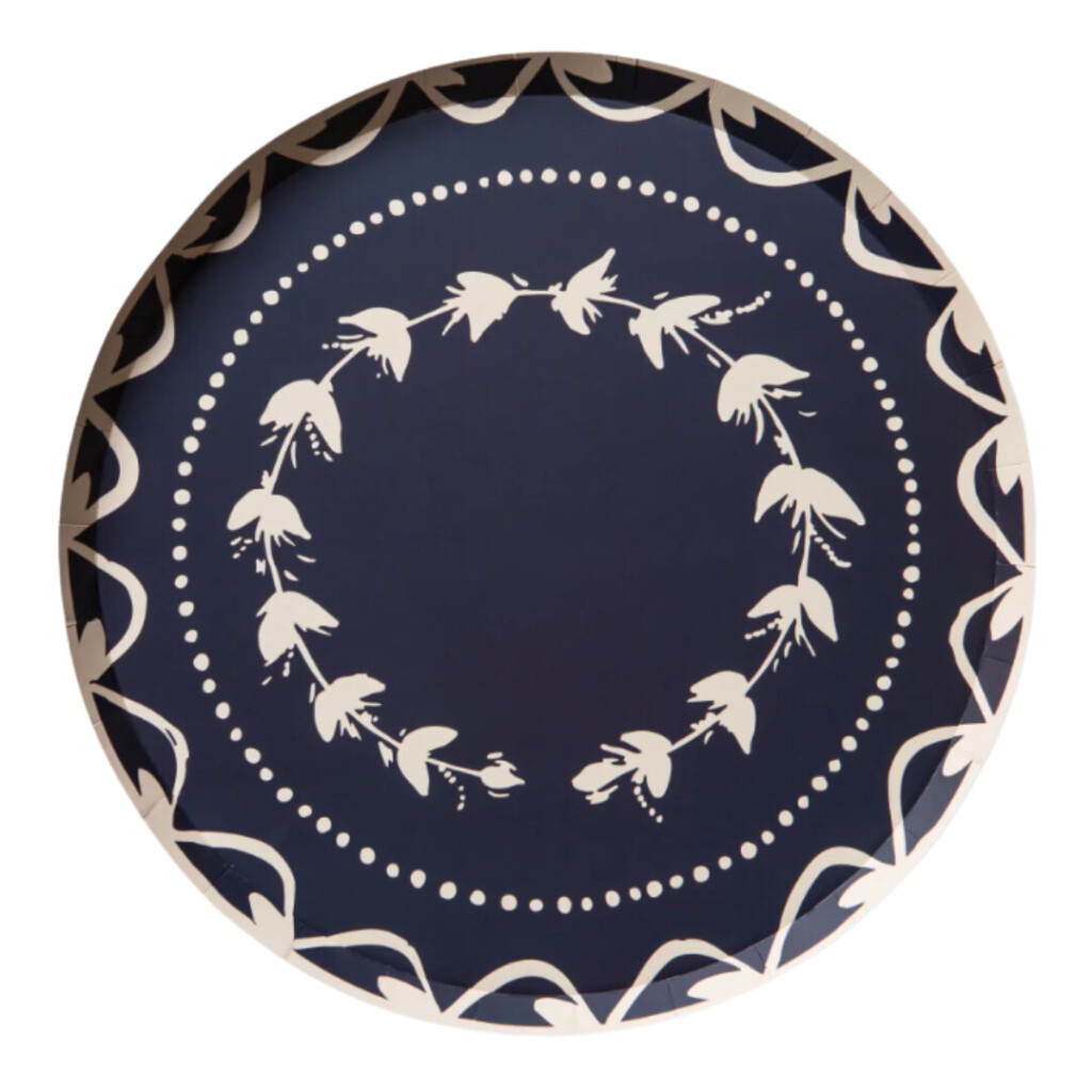 Blue ceramic dinner plate with white floral border pattern